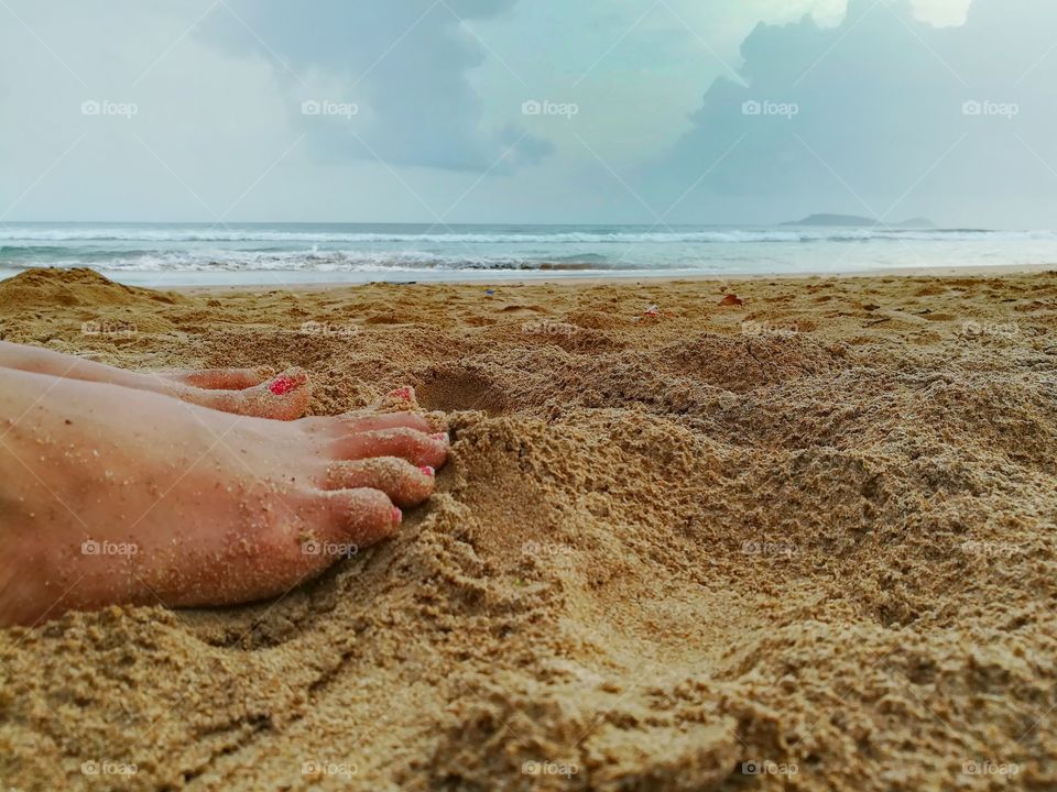 Woman alone at beach having peace.
