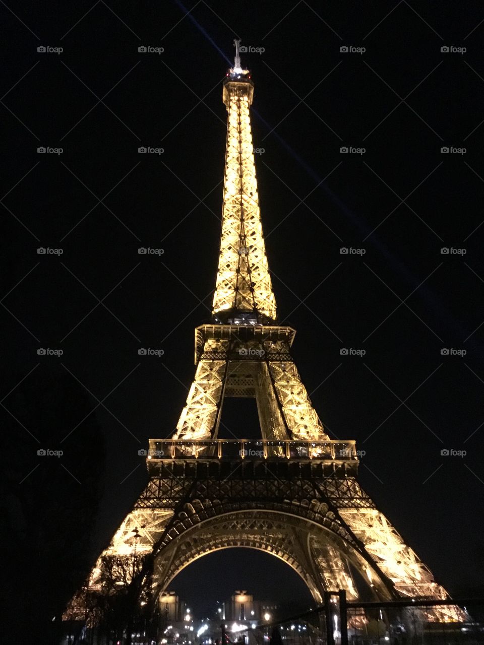 Eiffel Tower glowing at night