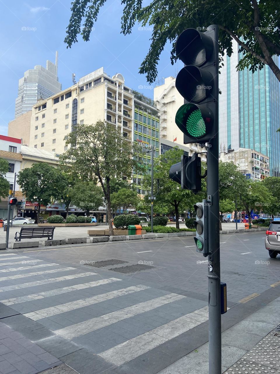 Green traffic light at crossing in Ho chi min city 