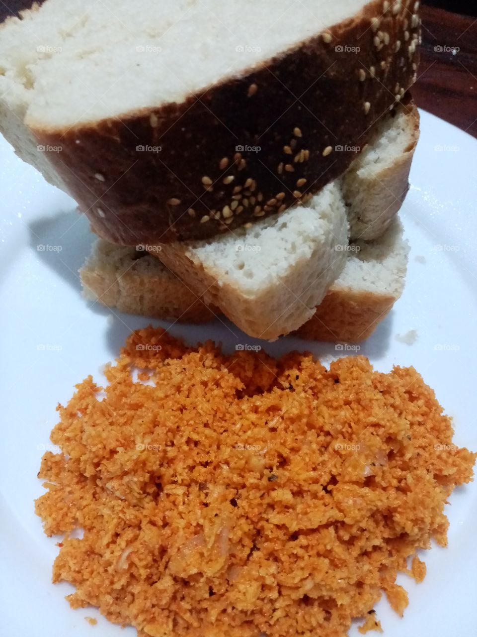 Yummy home made bread and coconut sambal. This combination is a very tasty food.