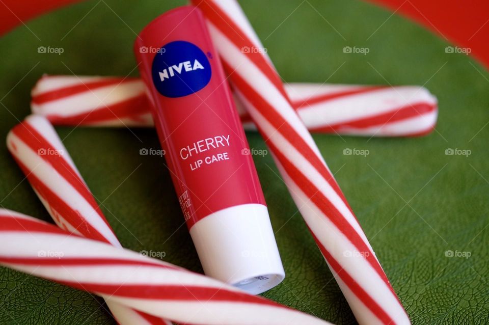 Cherry chapstick mixed in with candy canes, cherry chapstick at Christmas time, cherry chapstick out of place, what’s that doing there 