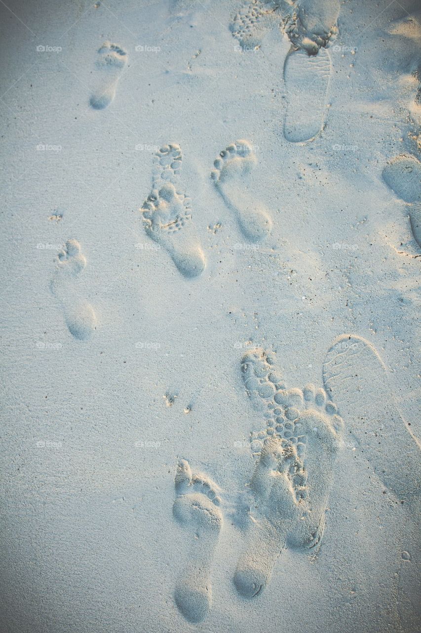 Footsteps at beach.