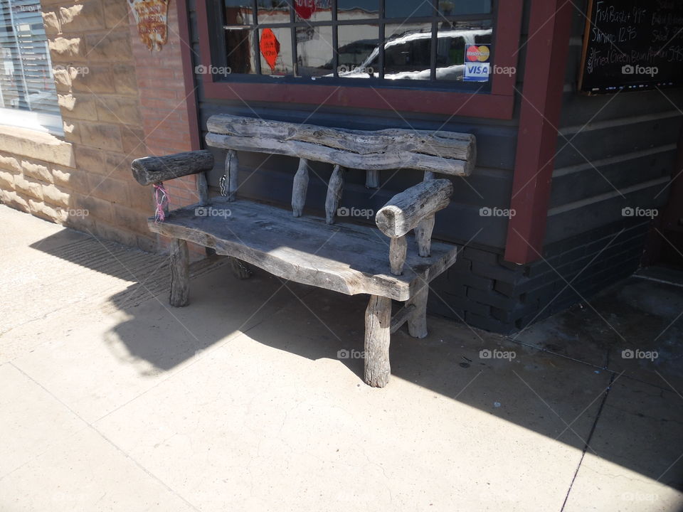 rustic bench. This is a picture of a store front in Jacksboro Texas that I visited this week end 🔚