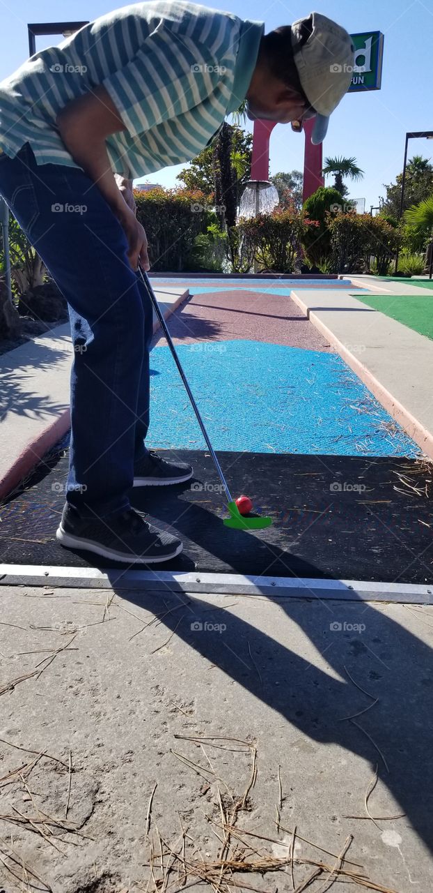 Player in mini golf