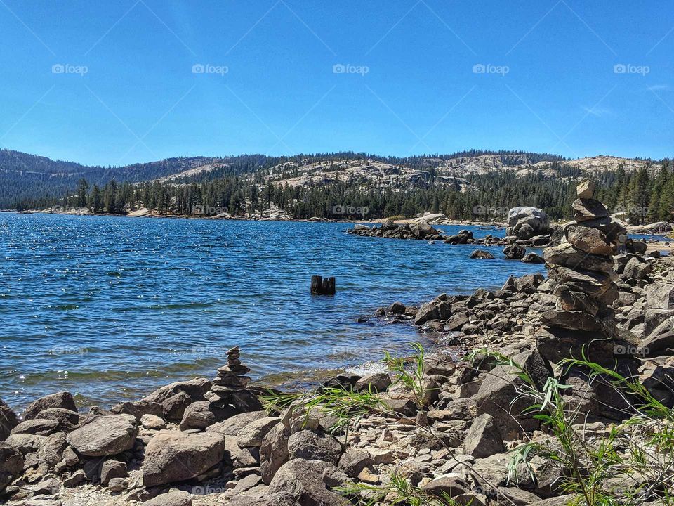 View of Stacked Stones and Lake