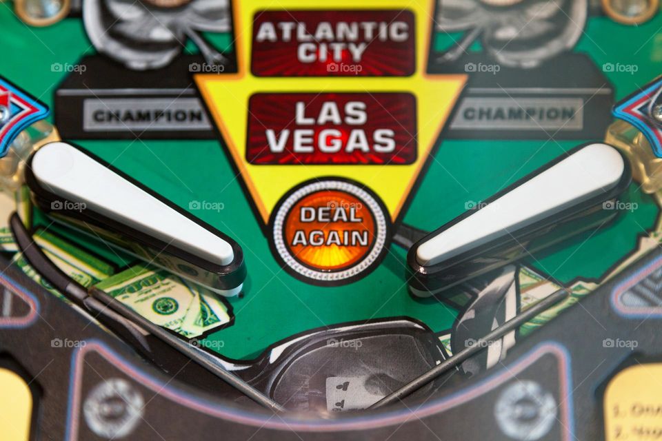 Close-up on the flippers of a vintage pinball machine