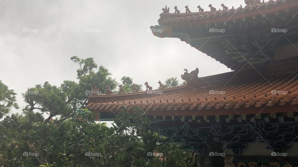 Pagoda Roof, People in Harmony with Technology, And all Animal Creations. Po Lin Monastery, Ngong Ping Village, Lantau Island, in Hong Kong
