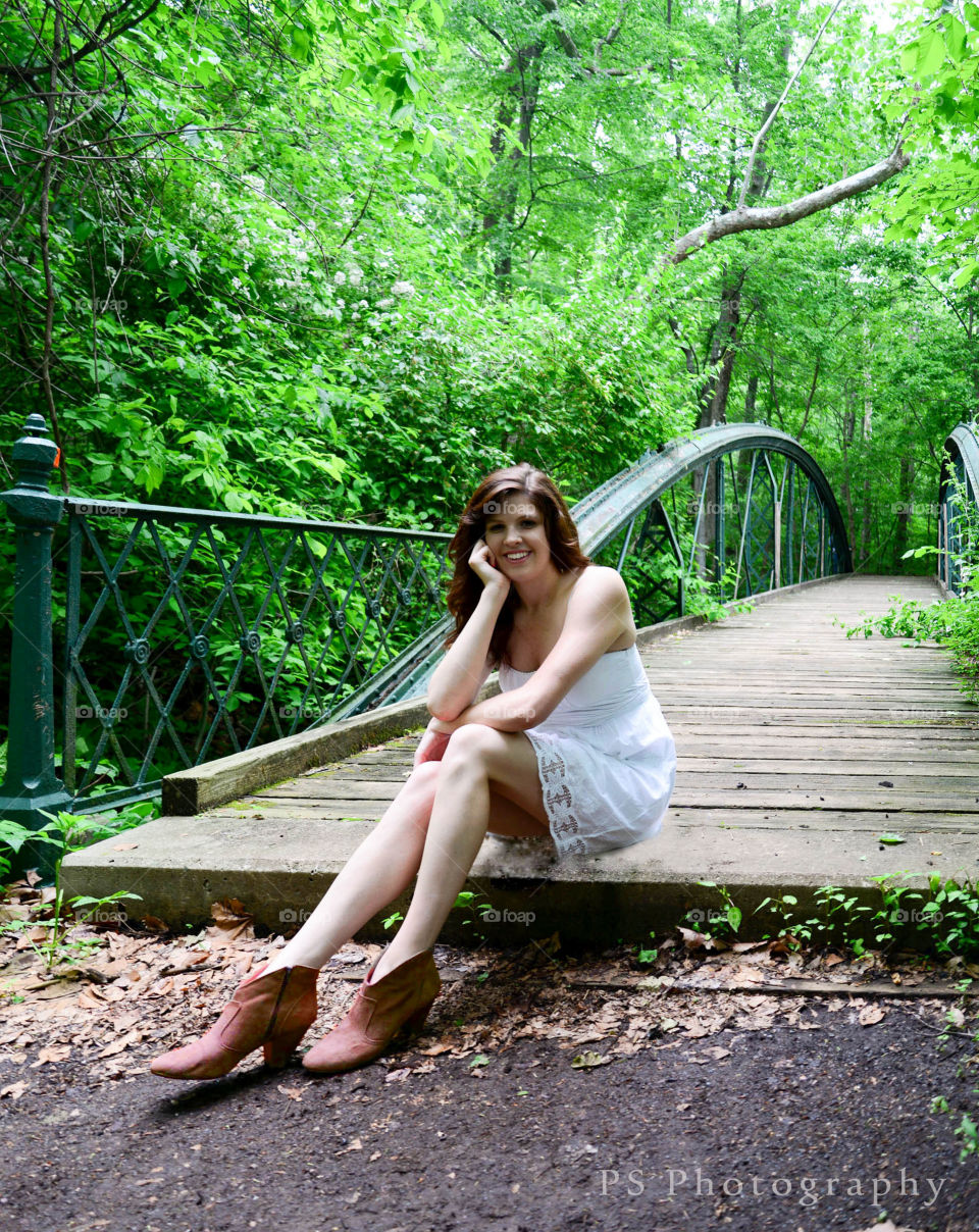 girl on bridge. secluded bridge makes an awesome background