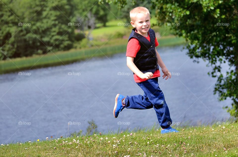 Happy running boy