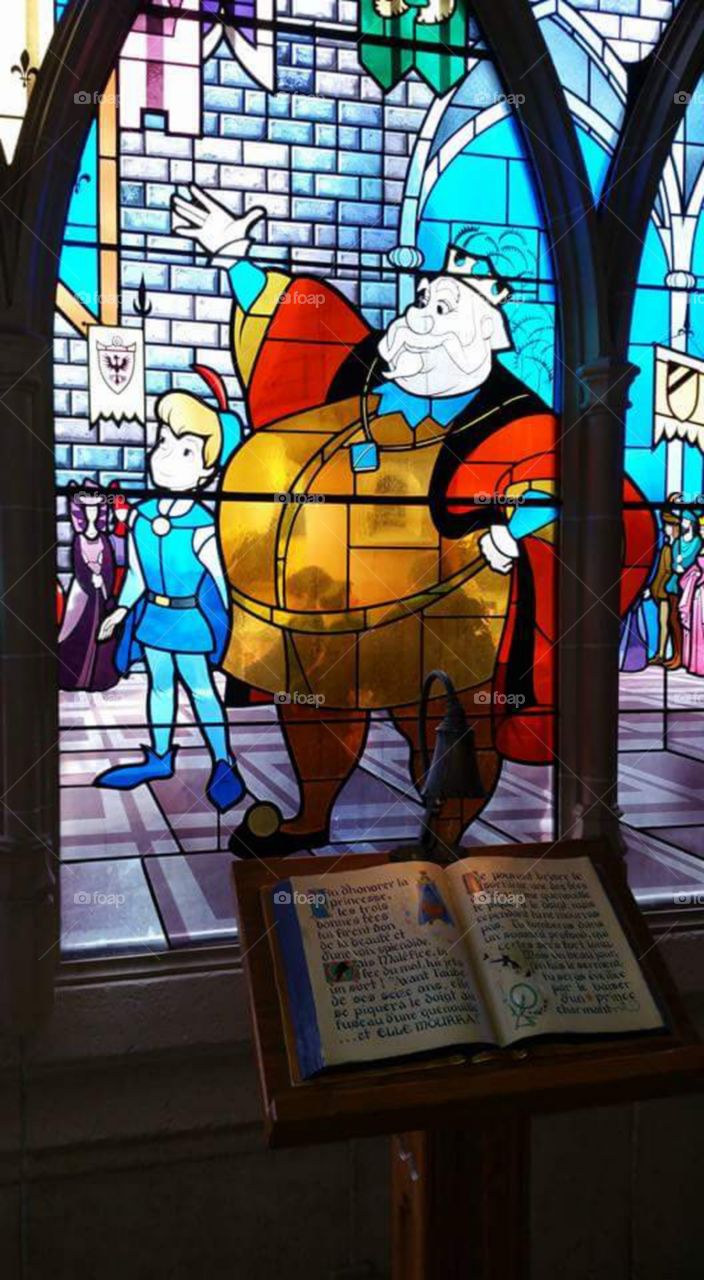 Disney land Paris / Euro Disneys
one of Sleeping beauty castles
stain glass window
(series available )
Sleeping Beauty Castle is the fairy tale structure castle at the center of Disneyland Park, Hong Kong Disneyland and Disneyland Paris. It is based on the late-19th century Neuschwanstein Castle in Bavaria, Germany,with some French inspirations (especially Notre Dame de Paris and the Hospices de Beaune).