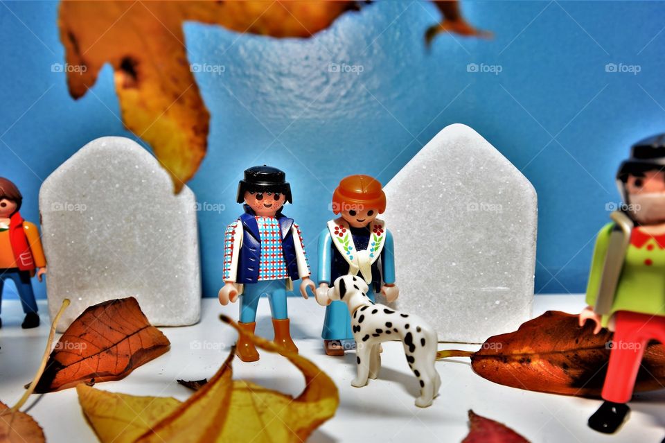 Playmobil figurines showing social distancing on a sunny autumn day