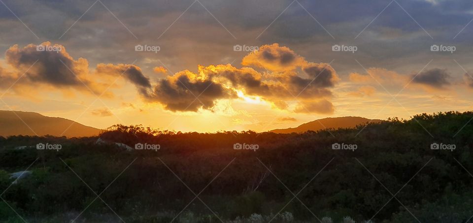 nuvens e pôr do 🌞