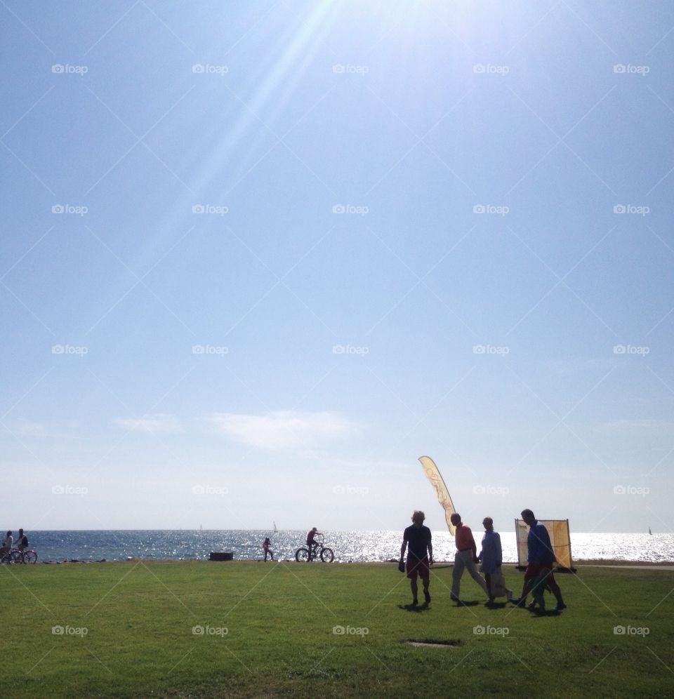 People  on the beach walk