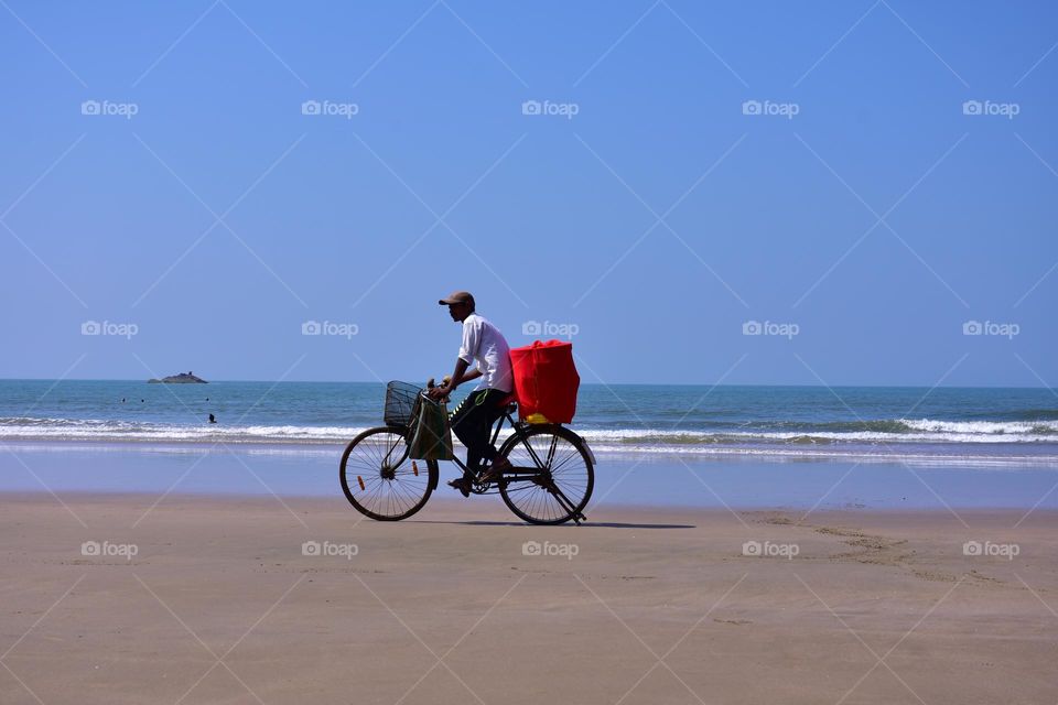 salesman on a bicycle