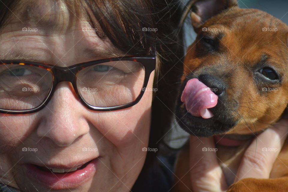 woman and puppy