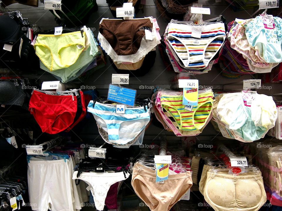 assorted female underwear on display at a store
