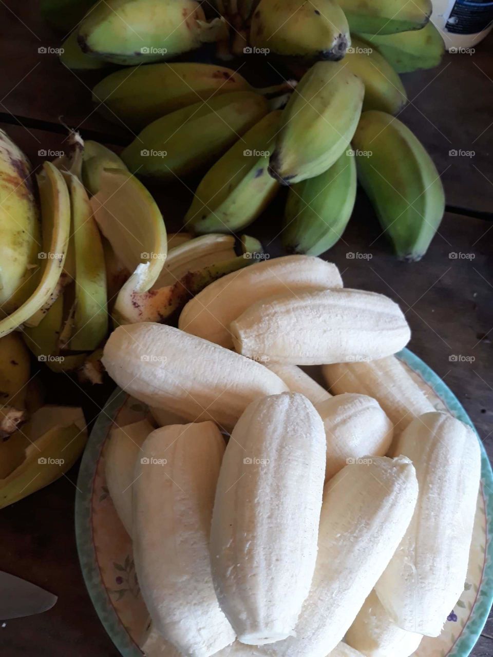 Preparing bananas for frying. An all-time family's favorite snacks.