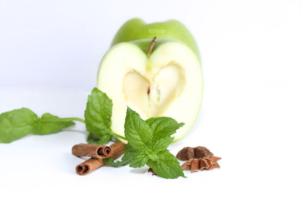 Green apple with mint leaf