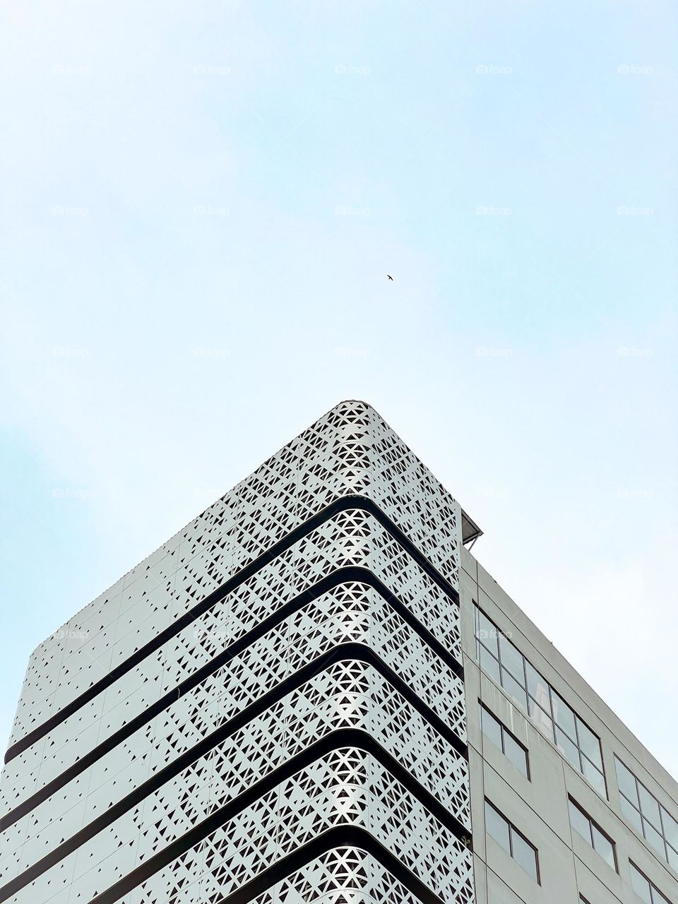 Rectangle building office with abstract triangle rooster