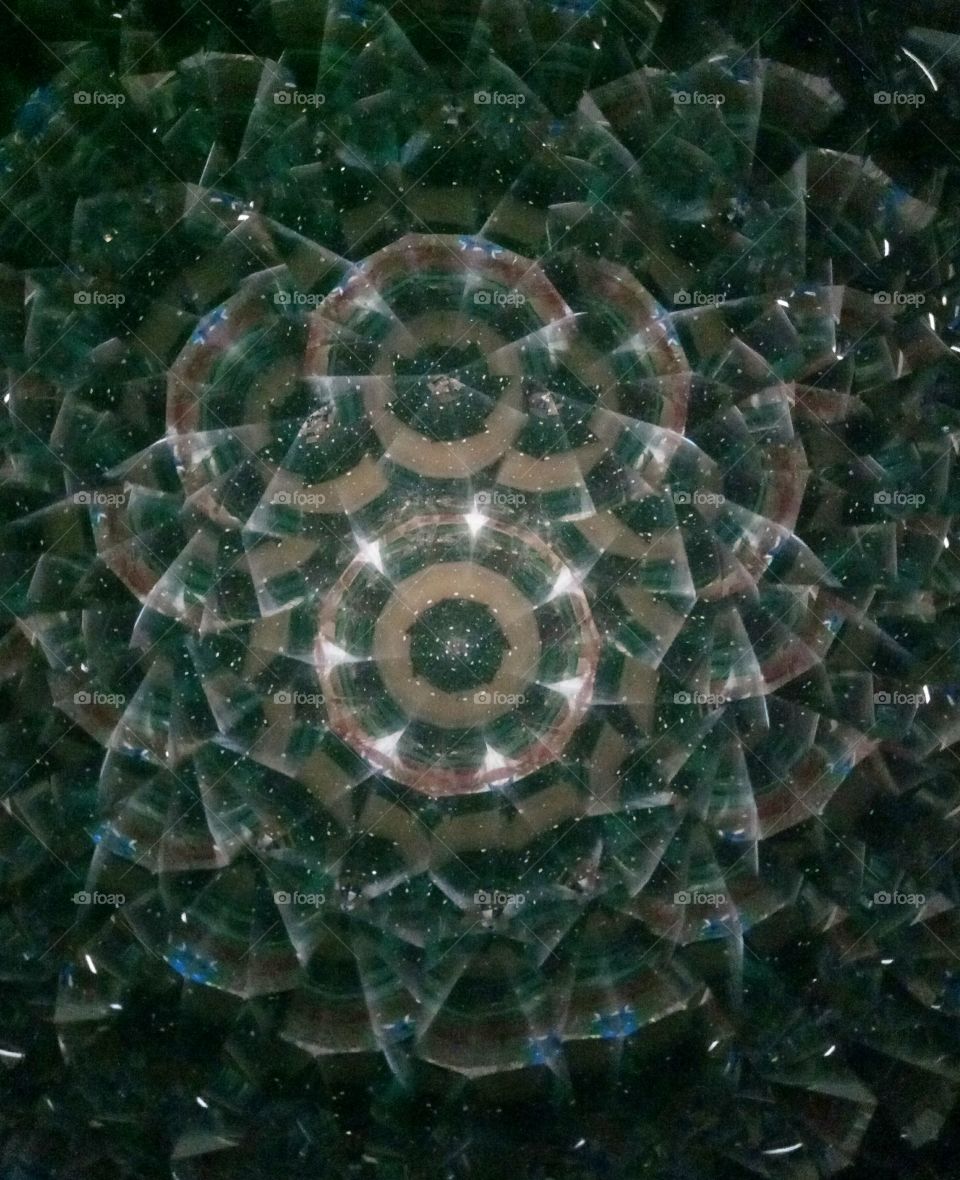 Glowing water on the decorated bottom of a pool