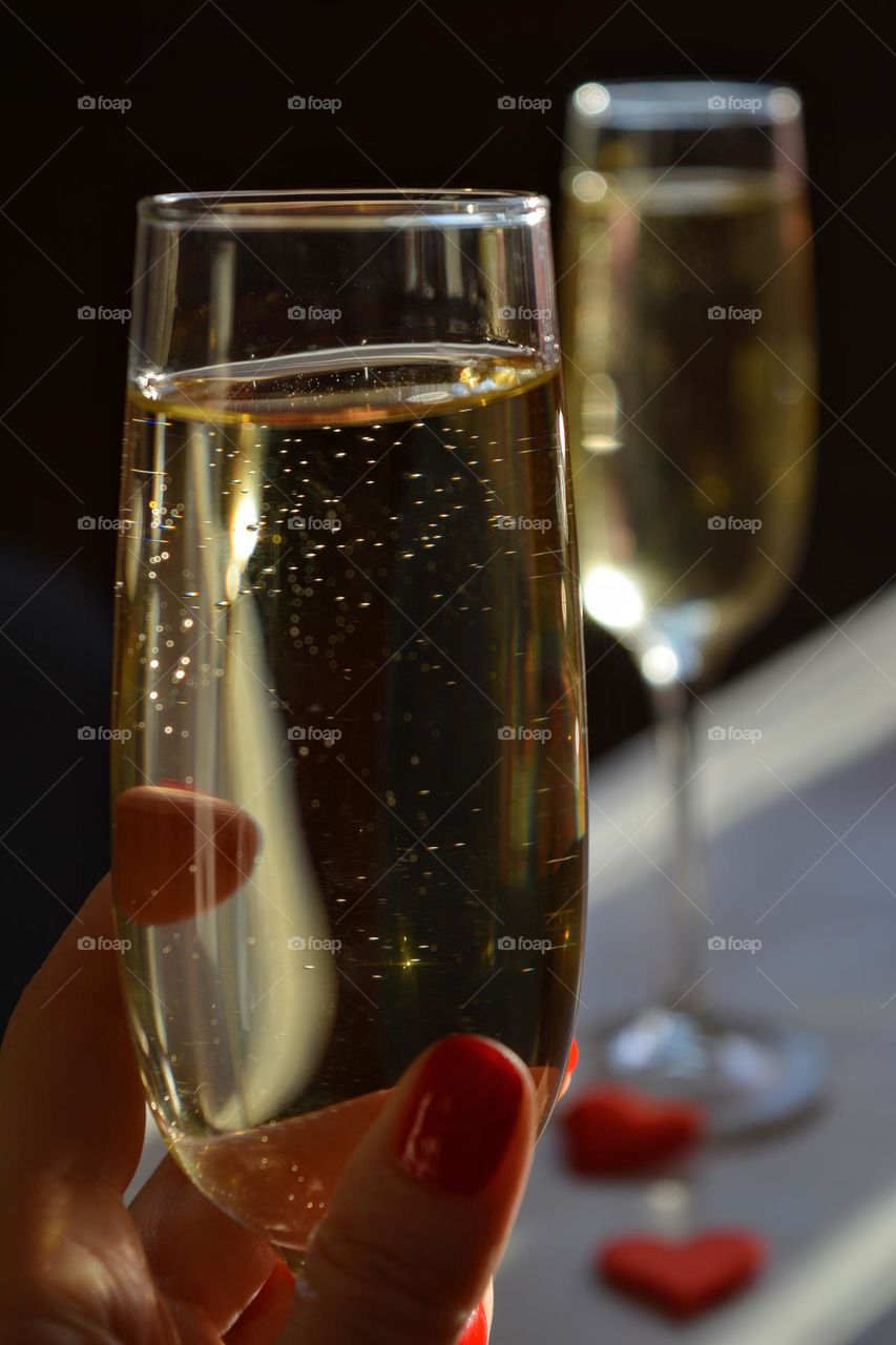 champagne glasses in the hand