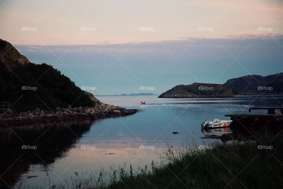 Scenic view of sea at sunset