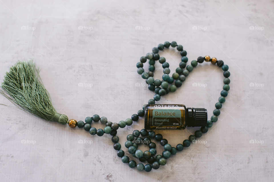 Balance doterra essential oil with mala beads - wellness workspace 
