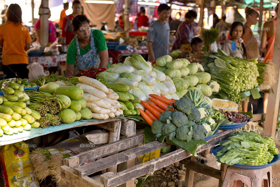 Vegetable stall at the local market. vendor in Thailand