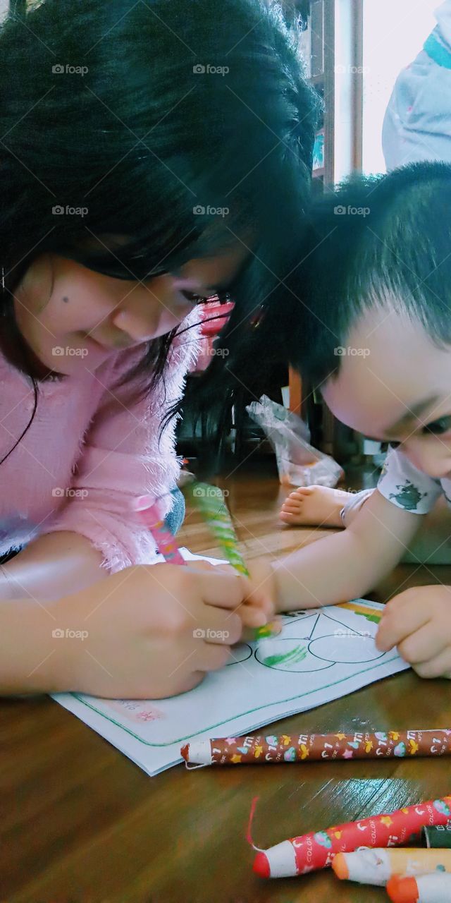 coloring the balloons with my little boy.