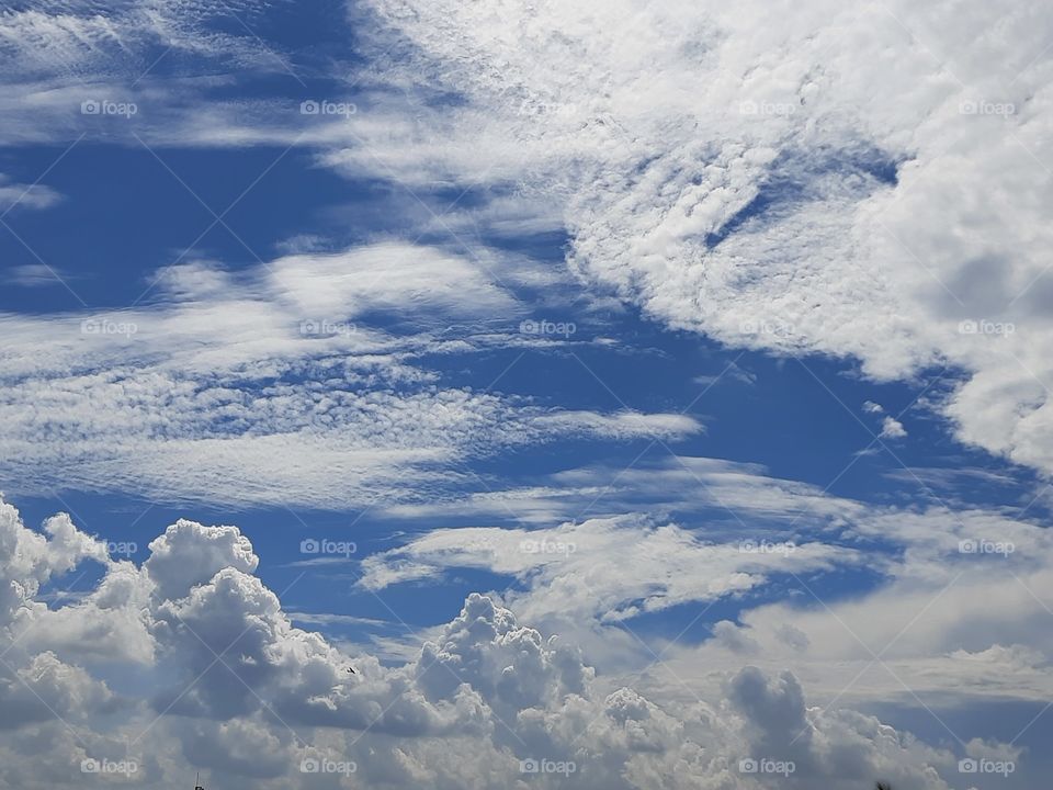 sky and clouds design around us