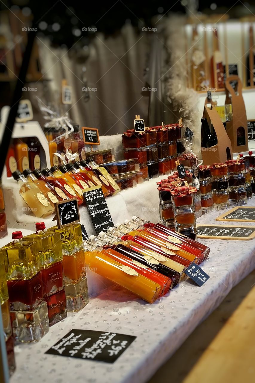Colorful bottles in a shop of Christmas market