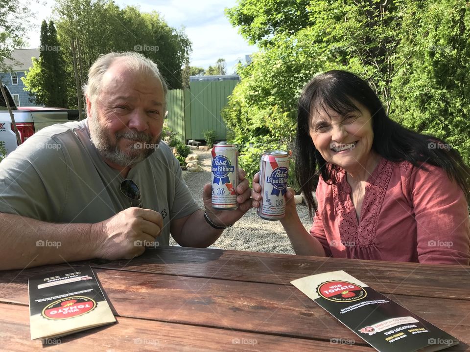 Enjoying their beers 