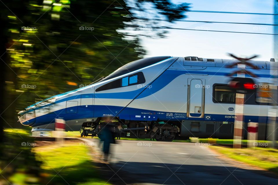 high-speed train on railway crossing