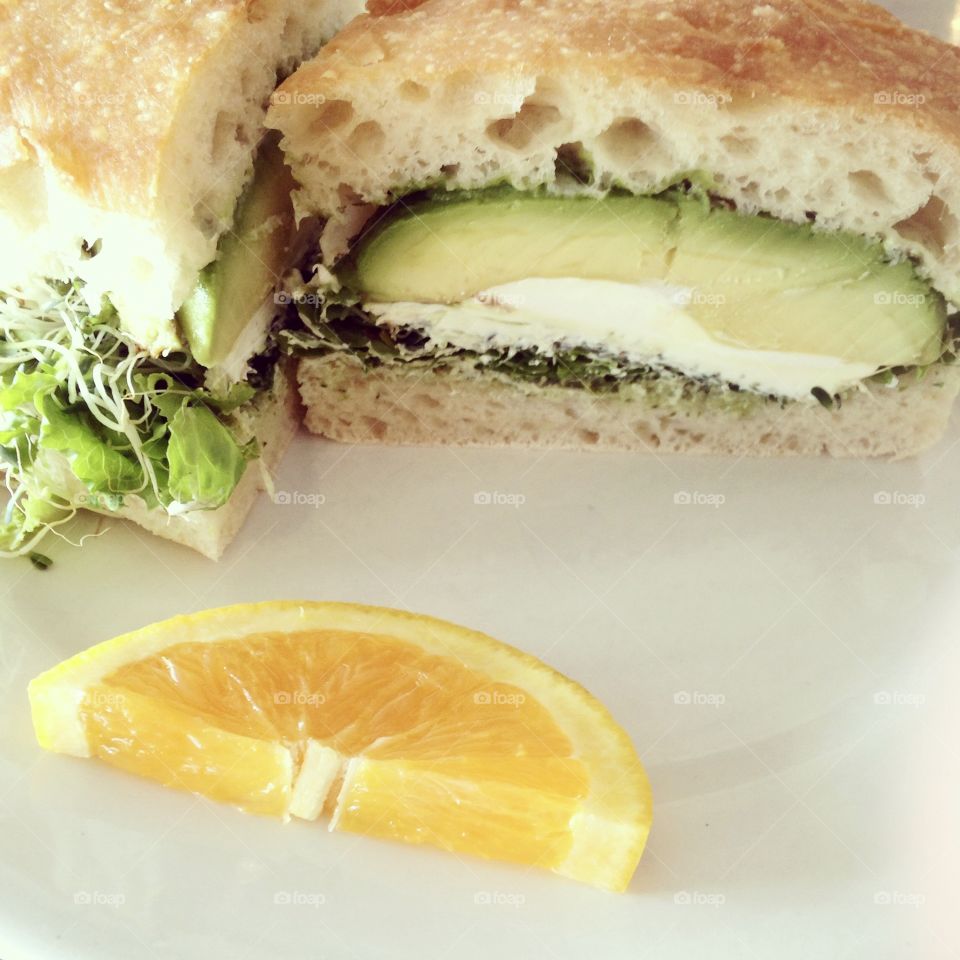 Delicious vegetarian avocado sandwich makes for a tasty and fulfilling lunch. 