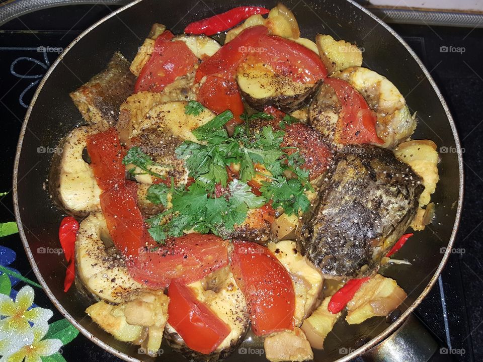 A kind of fresh water fish-turmeric and tomato