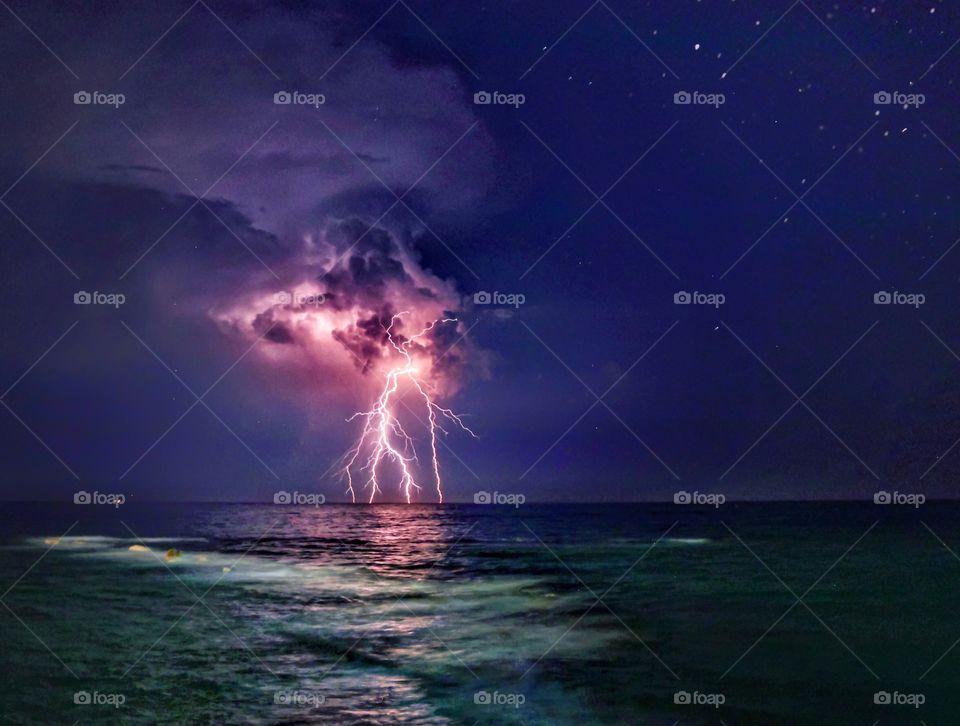 Thunderstorm with lightning over the sea