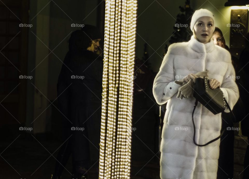 Beautiful Russian girl leaving a theatre 