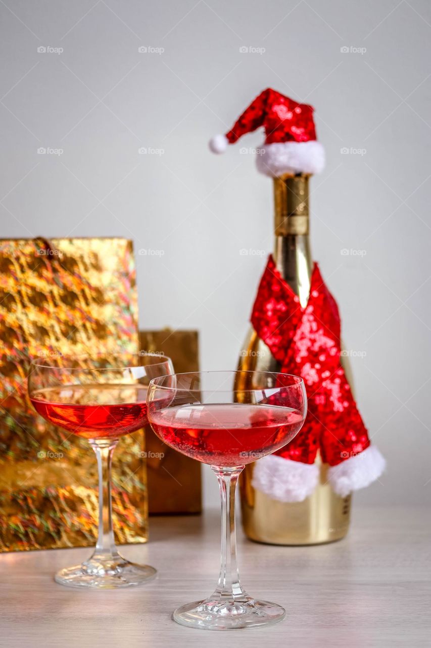 Pink champagne and presents to celebrate winter