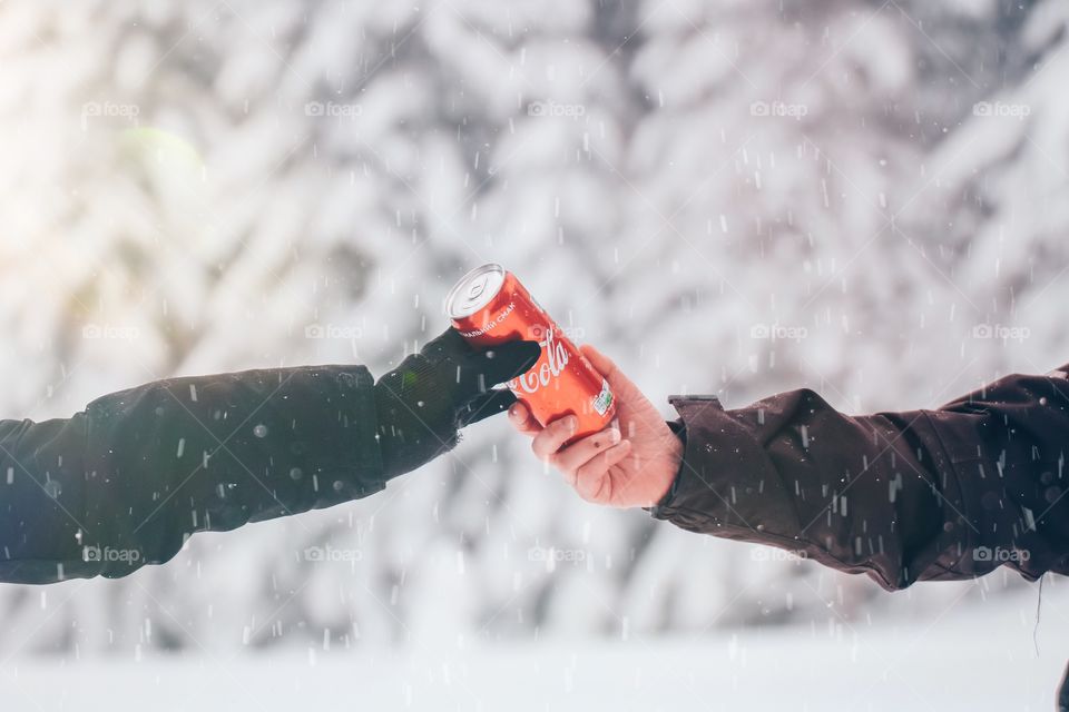 Holding Coca-Cola 