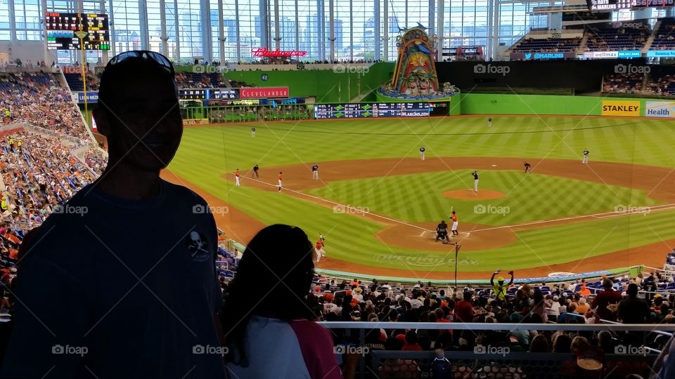 People enjoying a spring ballgame