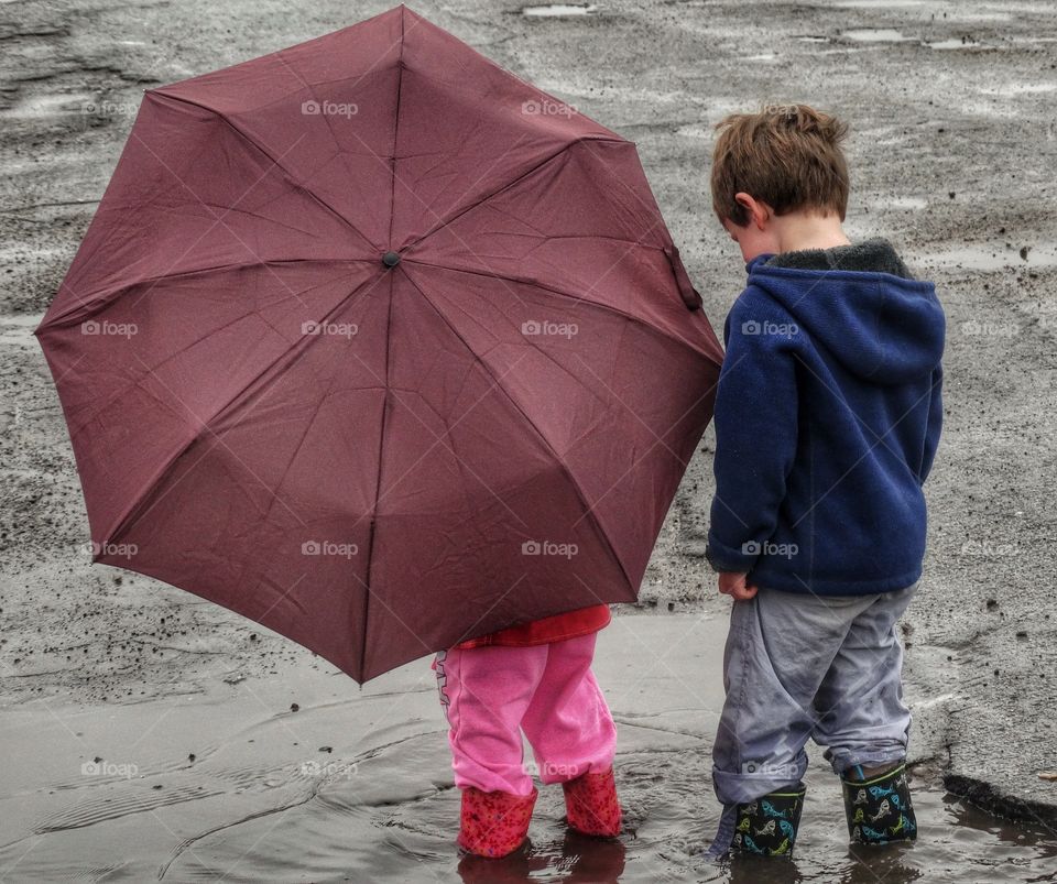 Boy And Girl And Umbrella