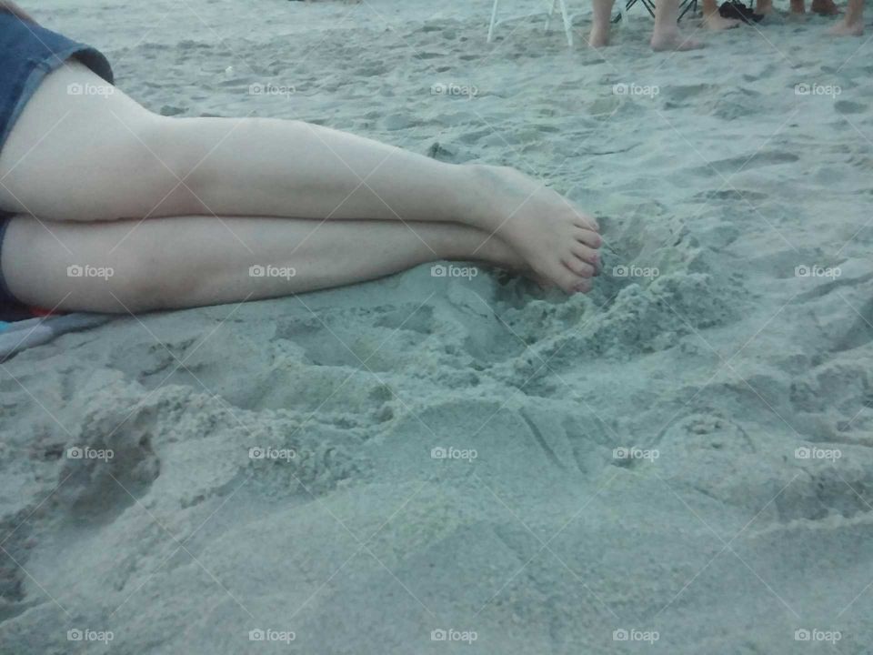 My sister - in - law in the sand,  toes in the sand, Myrtle Beach,  SC