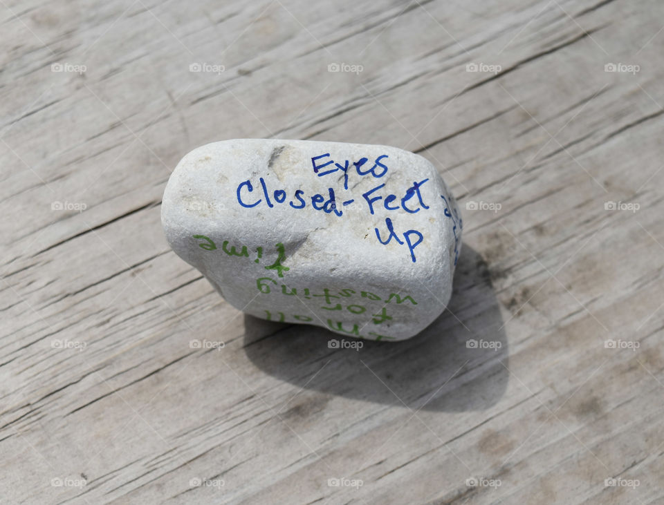 Stone with an affirmation written on it