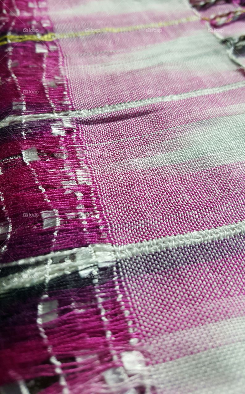 Close-up view of handwoven fabric
