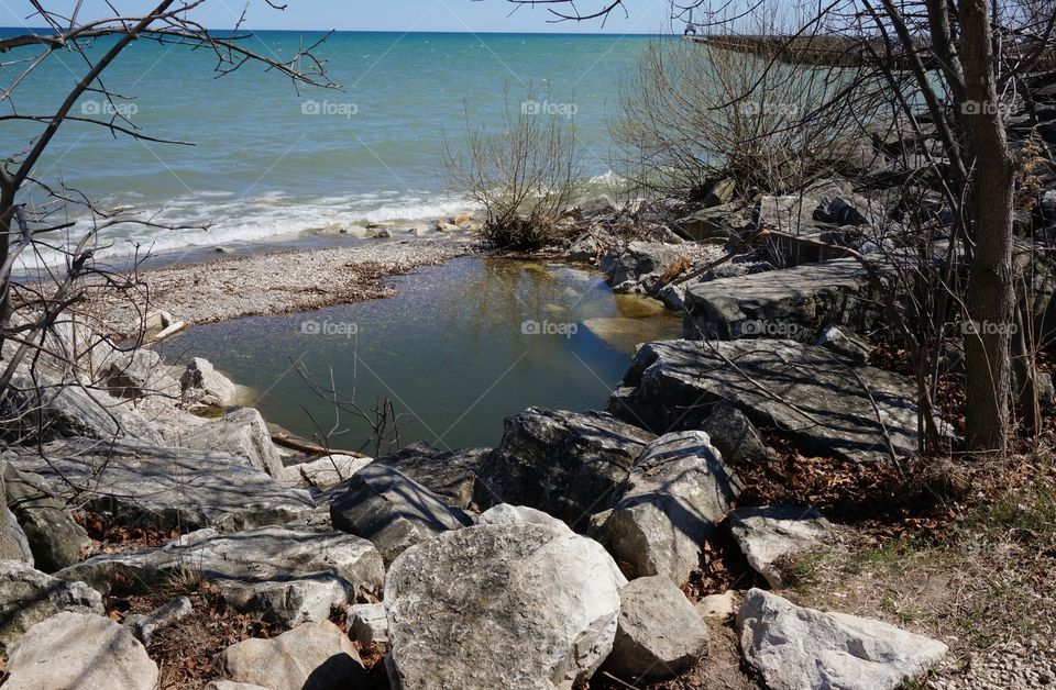 Shoreline Pool. Gentle waves rolling into a shoreline pool