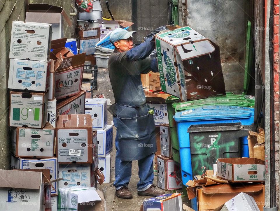 Taking Out The Trash. Recyclables Stacked Up For Collection
