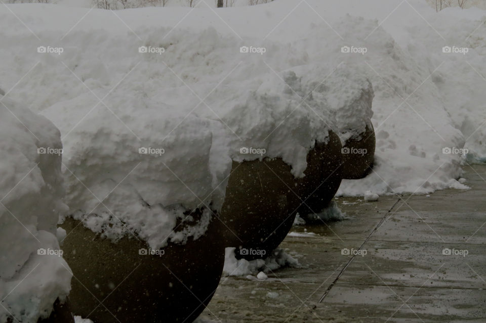 Heavy snow on planters