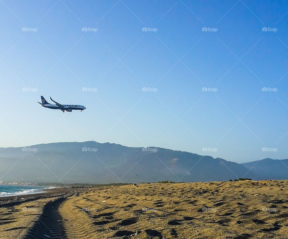In Calabria, Italy, there is an airport near the beach. It is really spectacular to see airplanes landing and taking off