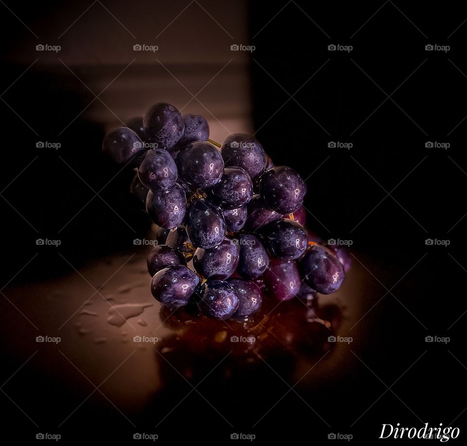 Color escapes from night’s dark abyss,
as shadows reborn are given shape.
And sunbeams gild the rim of the earth,
distilling reds into shades of grape.