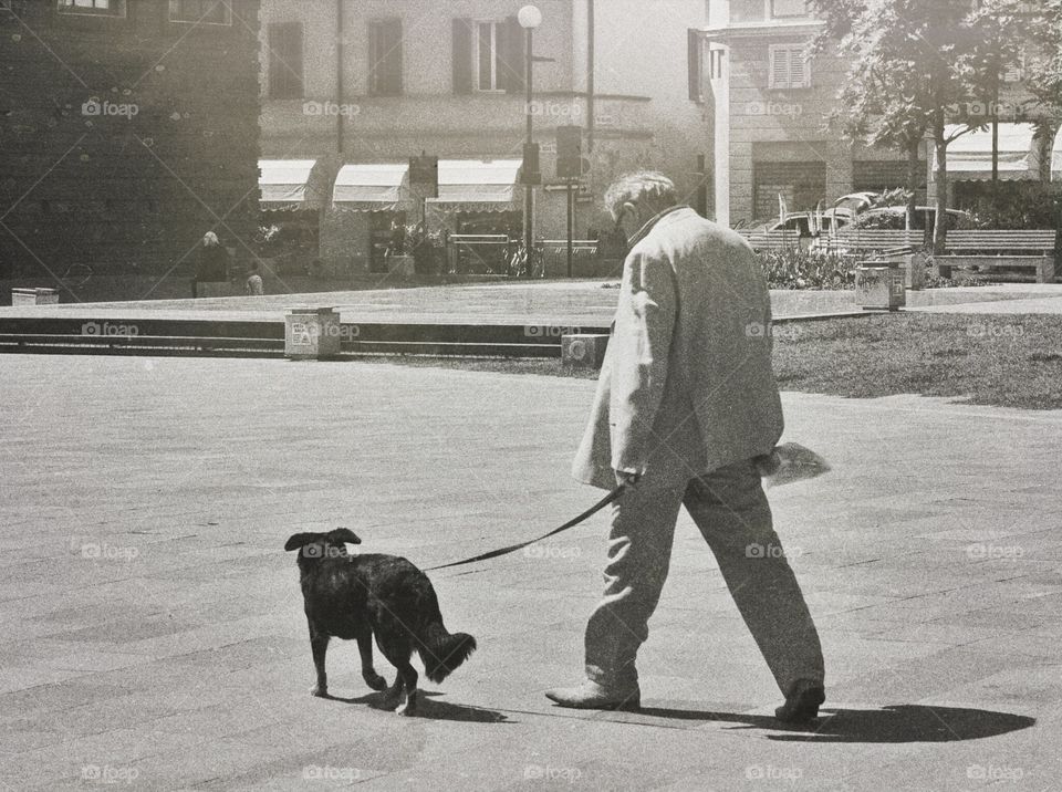 Man walks with his dog